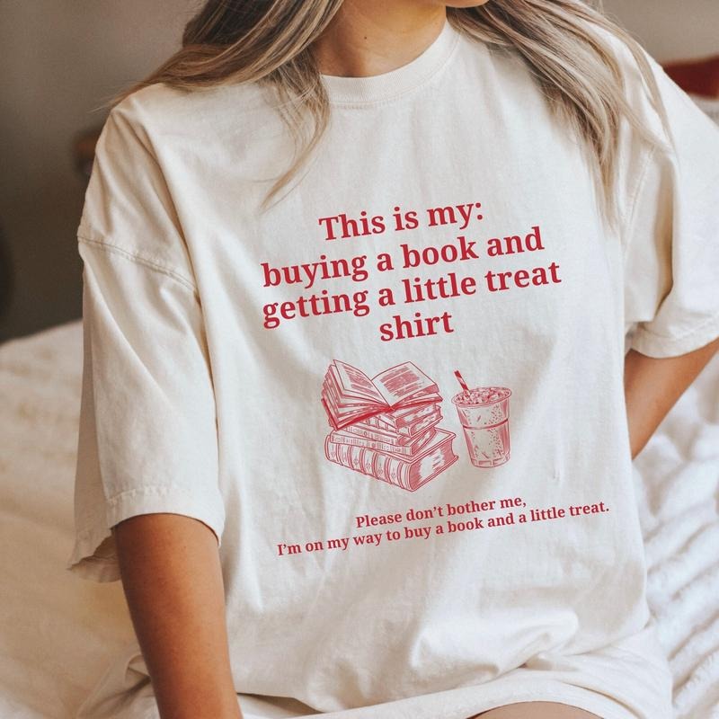 Buying a book and getting a little treat shirt. Bookish shirt. Retro book shirt. Book lover shirt. Funny book T-shirt.