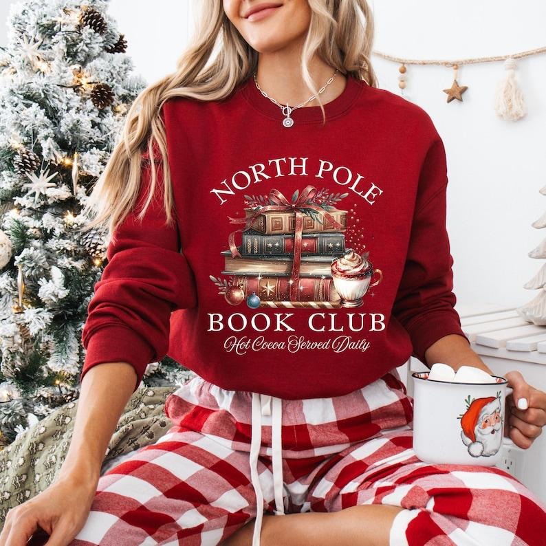 Bookish Christmas Sweatshirt, North Pole Book Club Shirt, Santa Sweatshirt for Book Lover, Christmas Retro Book Worm,...