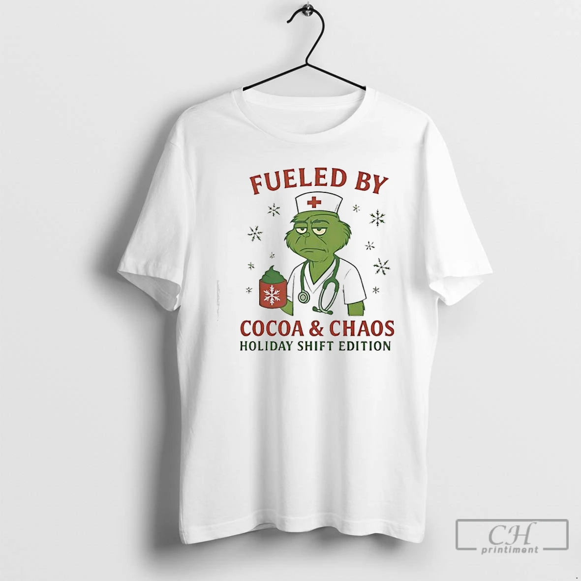 Classic Grinch Green Fueled By Cocoa Chaos Holiday Shift Edition Nurse T-Shirts, Hoodie, Sweatshirt | PureTeeCo.com