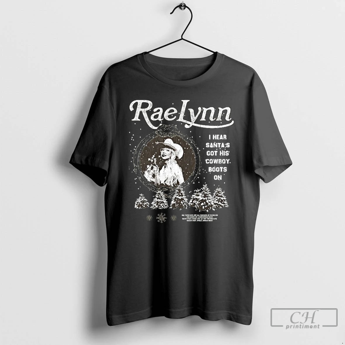 Classic Raelynn I Hear Santas Got His Cowboy Boots On Xmas Christmas T Shirts Sweater Hoodie, Sweatshirt | PureTeeCo.com