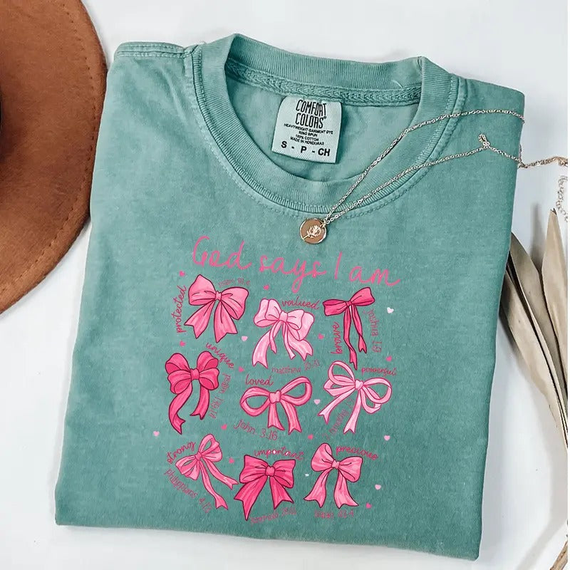 Comfort Colors God says I am Coquette Shirt, Pink Coquette Bows Shirt, Bible Verse Tee, Christian Bow T-Shirt Hoodie,...