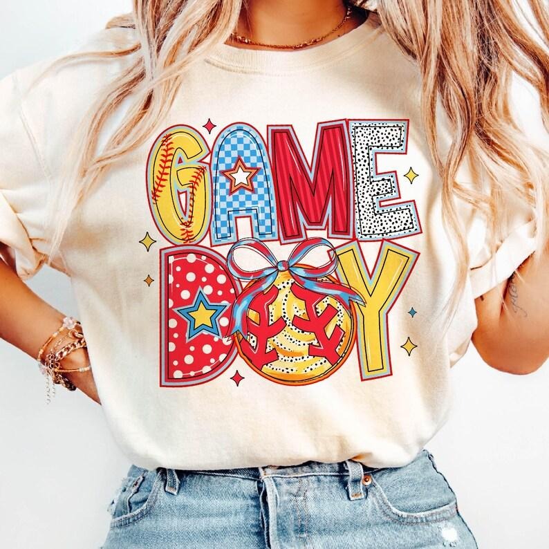 Coquette Softball Mama Game Day Brushstroke Tis the Season T-Shirt Hoodie, Sweatshirt | PureTeeCo.com