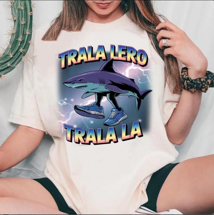 Funny Tralalero Tralala graphic tee, Shark With Shoes Shirt Cotton Fabric Hoodie, Sweatshirt | PureTeeCo.com