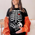 Halloween Pregnancy Announcement Pregnant Skeleton Shirt - Halloween Maternity Shirt Hoodie, Sweatshirt | PureTeeCo.com