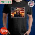 Hillary Clinton and the burning city and US flag in the background shirt