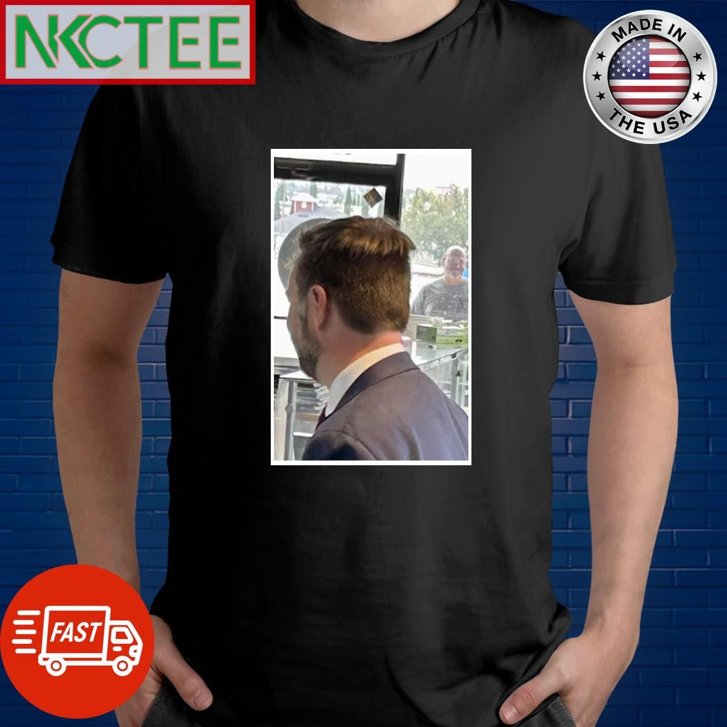 JD Vance with an awkward haircut shirt