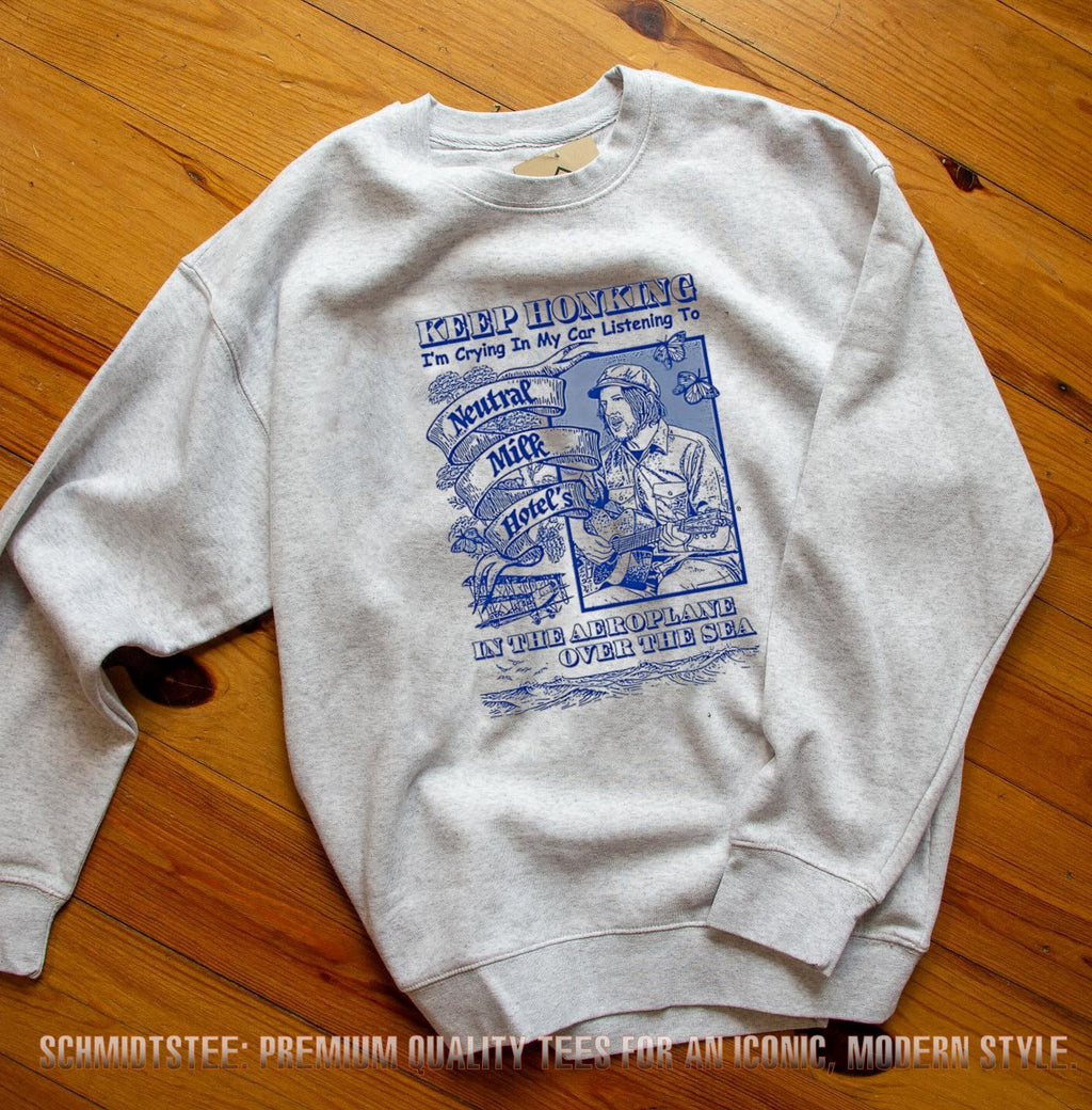 Keep honking I’m crying in my car listening to Neutral Milk Hotel’s in the aeroplane over the sea shirt