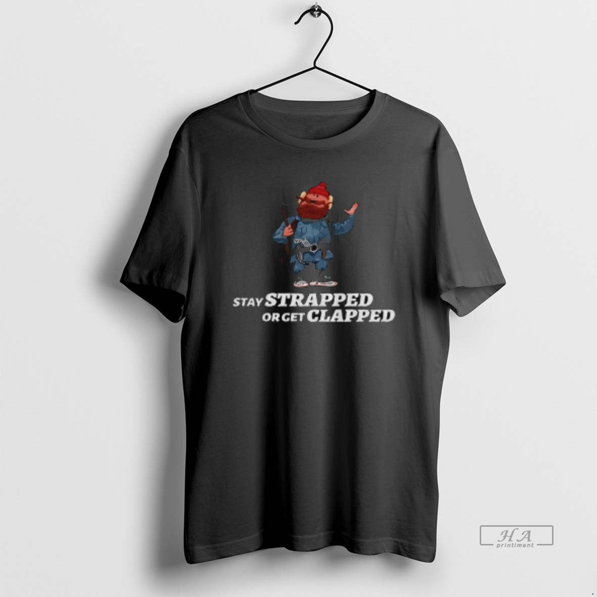 Official Yukon Cornelius Stay Strapped Or Get Clapped T-Shirts, Hoodie, Sweatshirt | PureTeeCo.com