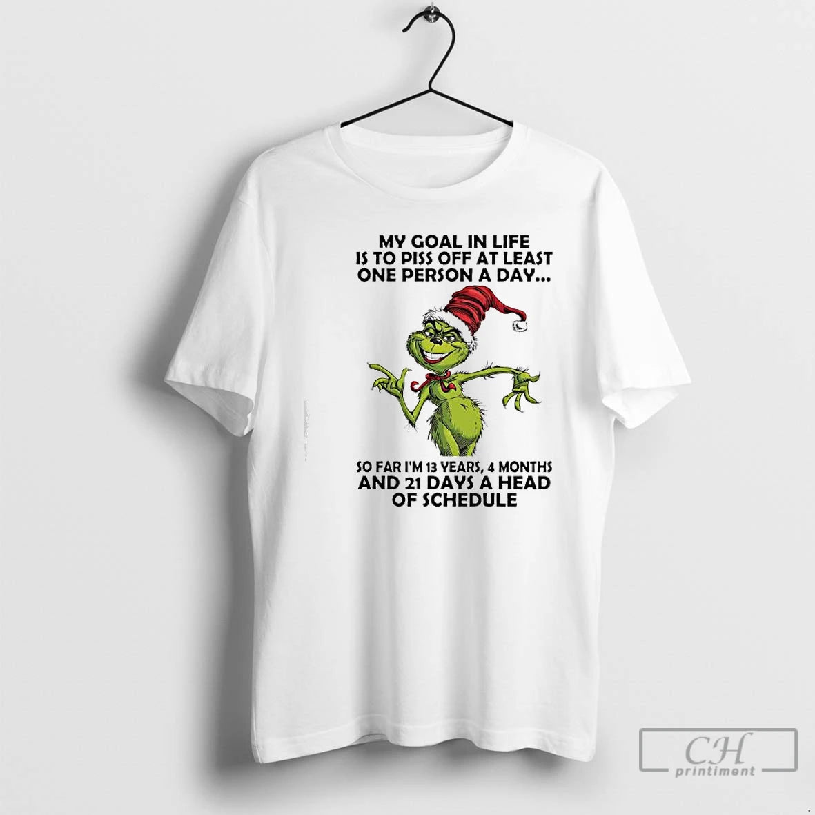 Premium Grinch Goal In Life Is To Piss Off At Least One Person A Day T-Shirts, Hoodie, Sweatshirt | PureTeeCo.com