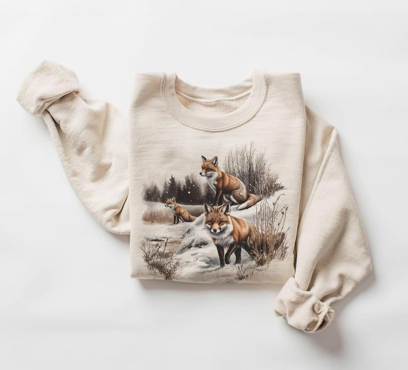 Retro Red Foxes Winter Scene Sweatshirt - 90s Fox Snowy Forest Wilderness Outfit - Boho Unisex Crewneck Sweatshirt...