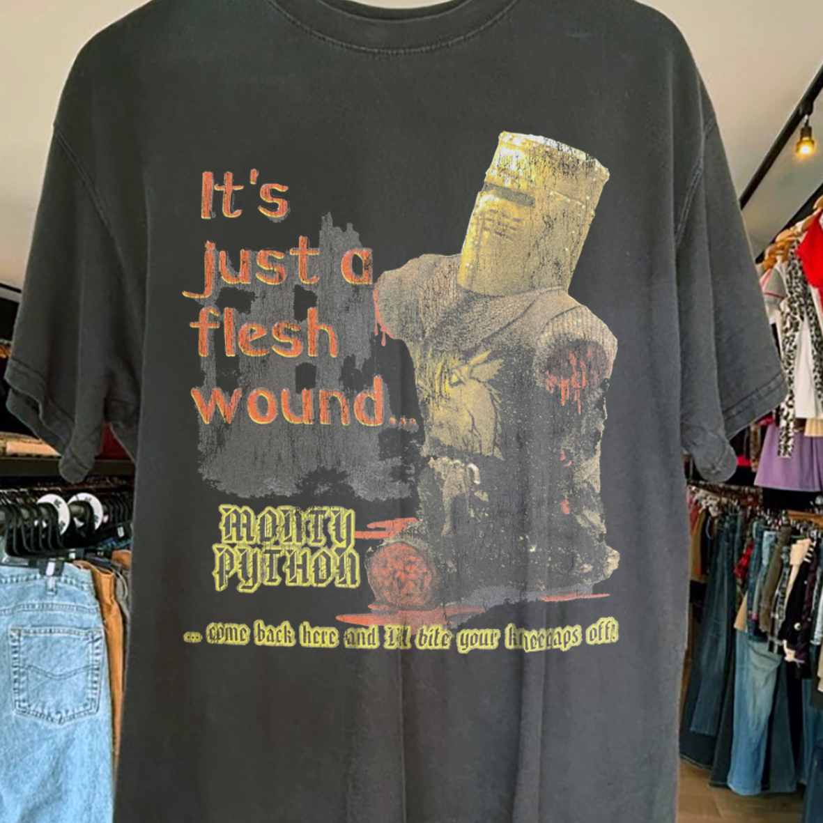 IT'S JUST A FLESH WOUND MONTY PYTH0NS 2001 PROMO VINTAGE WASHED BLACK T-SHIRT Hoodie, Sweatshirt | PureTeeCo.com (Image 2)