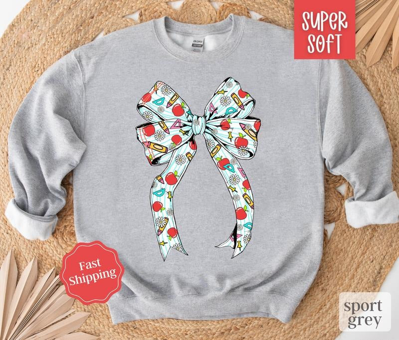 Teacher Bow Sweatshirt, Teach Crewneck, Gift for Teacher, Womens Sweatshirt T-Shirts, Hoodie | PureTeeCo.com