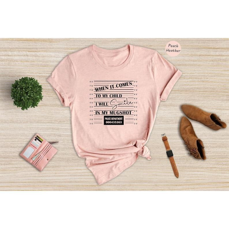 When it Comes to My Child I Will Smile in My Mugshot Shirt, Mom Life Shirt, Mom Lover Shirt, Dad Life Shirt, Best Dad  T-shirt, sweater and Hoodie Cotton