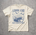 A Book A Day Fantasy Dragon Castle Graphic T-Shirt Dark Academia Reader Tee Image 1 of 3