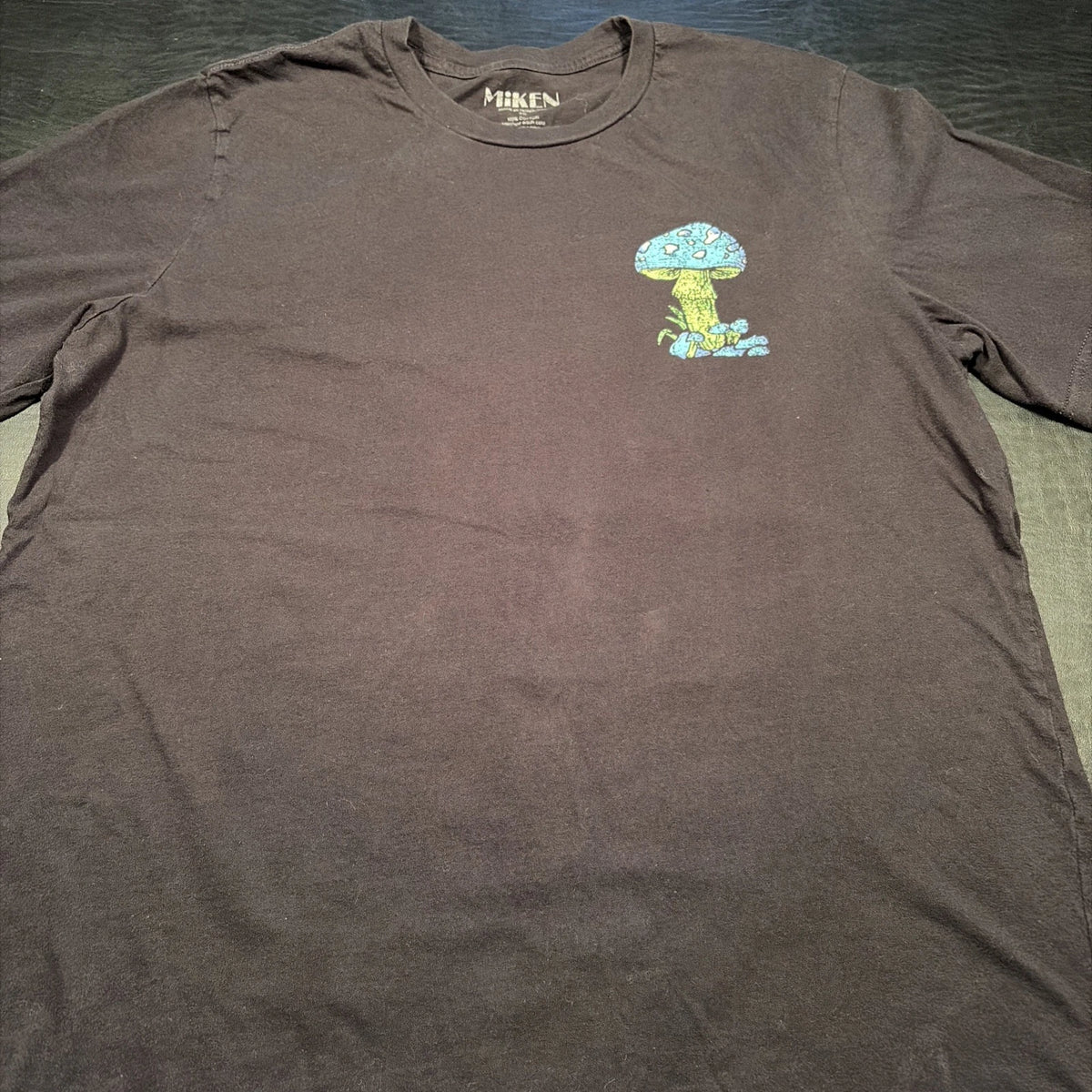 Men's size 2X MIKEN Black T-Shirt with Dazed Mushroom Graphic.