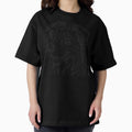 A playful Border Collie herding sheep in a green pasture. Oversized T-Shirt Hoodie, Sweatshirt | PureTeeCo.com