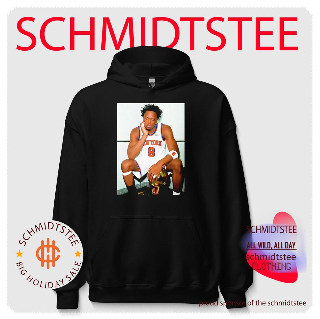 New York Knicks OG Anunoby sitting with trophy shirt