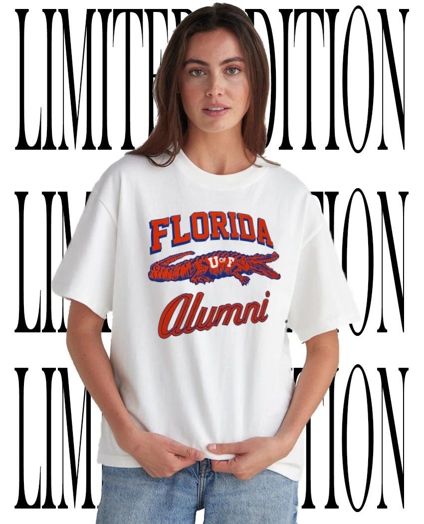 Tim Tebow wearing University of Florida Alumni Gator shirt