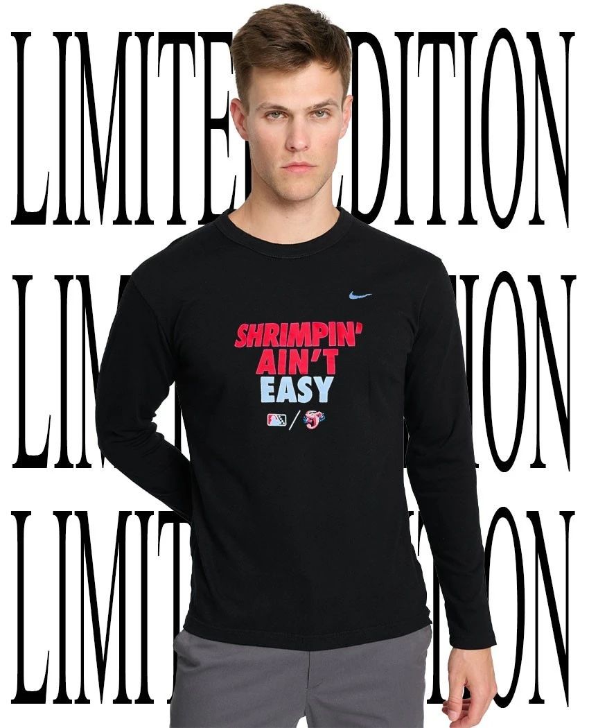 Thomas White wearing Shrimpin’ ain’t easy Jacksonville Jumbo Shrimp shirt