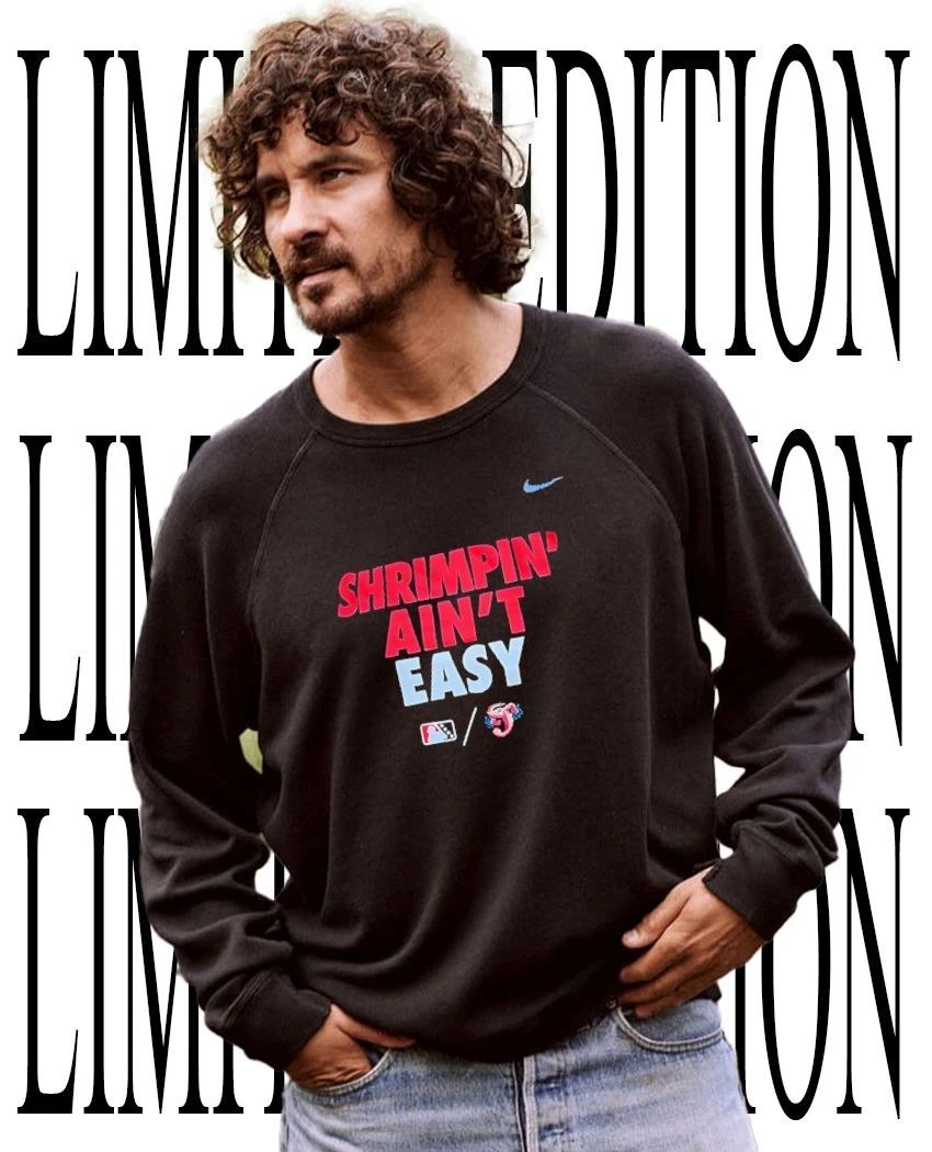 Thomas White wearing Shrimpin’ ain’t easy Jacksonville Jumbo Shrimp shirt
