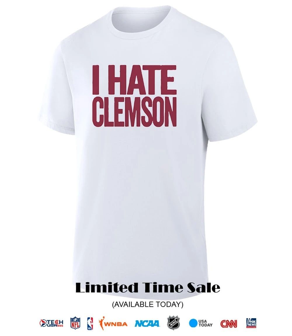 Greg Clark wearing I hate Clemson shirt