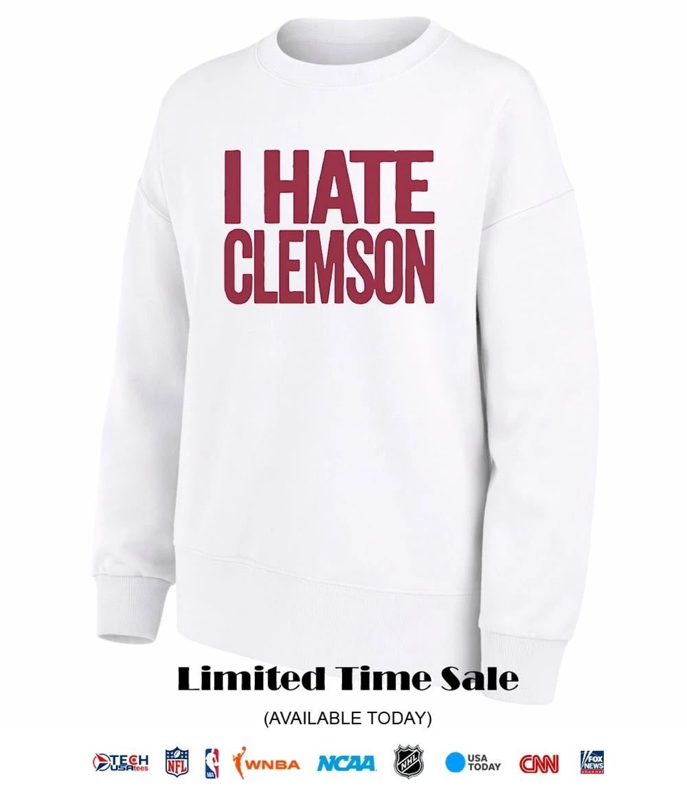 Greg Clark wearing I hate Clemson shirt