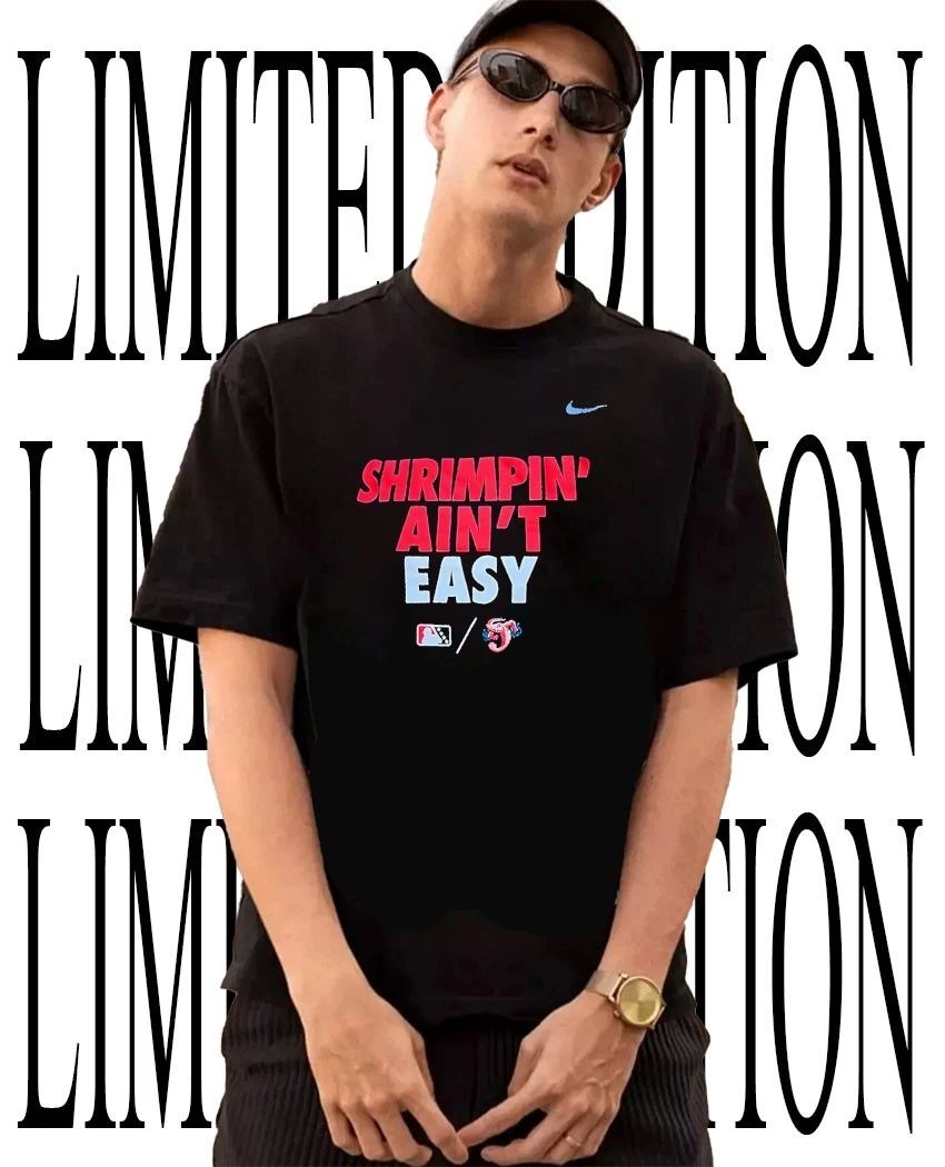 Thomas White wearing Shrimpin’ ain’t easy Jacksonville Jumbo Shrimp shirt