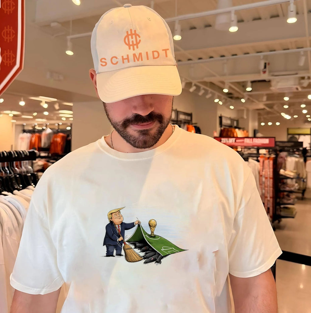 Trump versus Hormuz beside World Cup illustration shirt