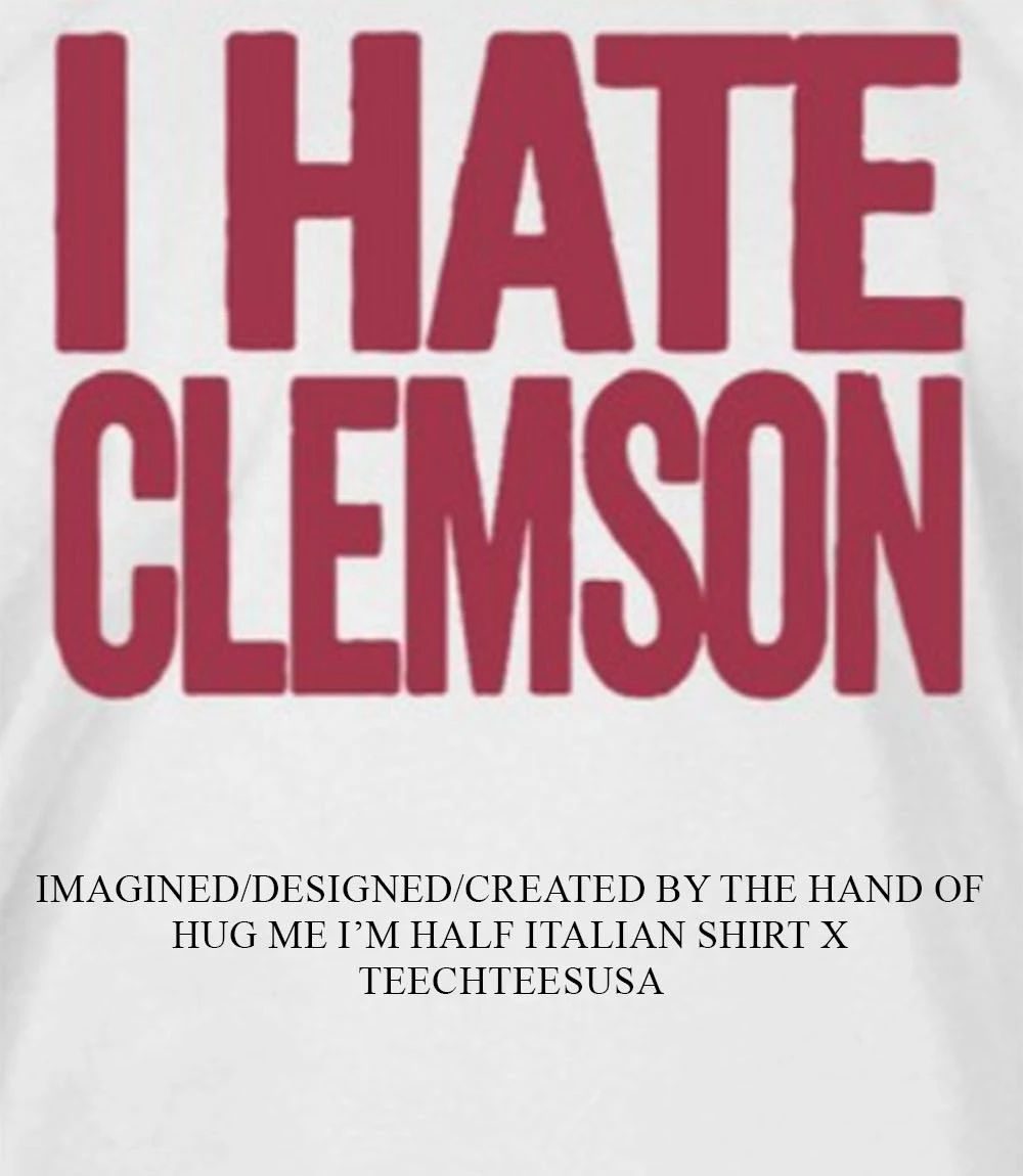 Greg Clark wearing I hate Clemson shirt