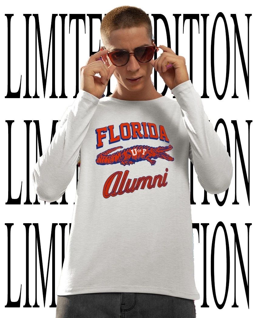 Tim Tebow wearing University of Florida Alumni Gator shirt