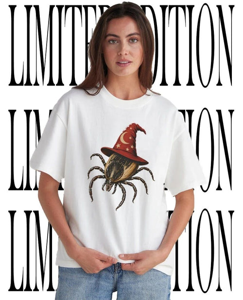 A tick wearing wizard’s hat shirt