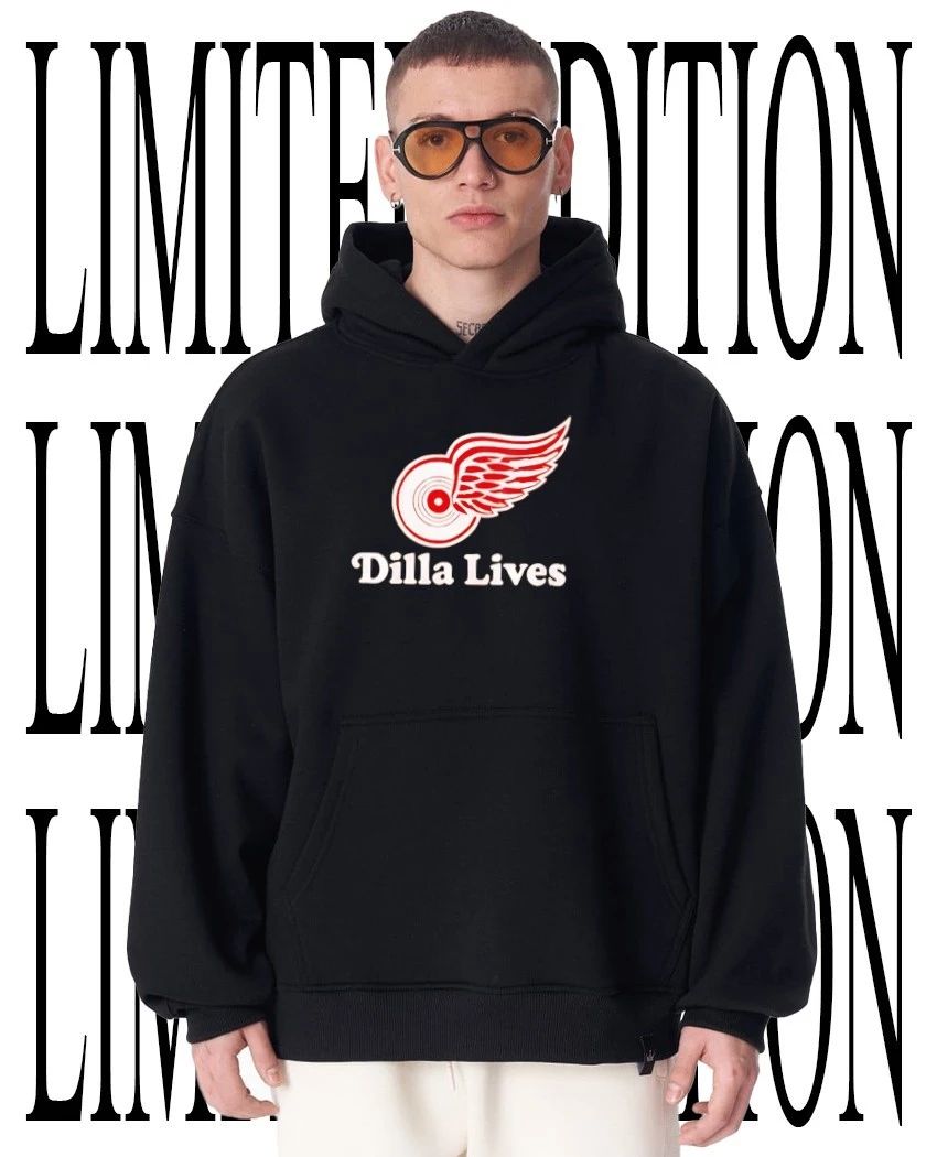 Drake wearing Dilla Lives Detroit Red Wings shirt
